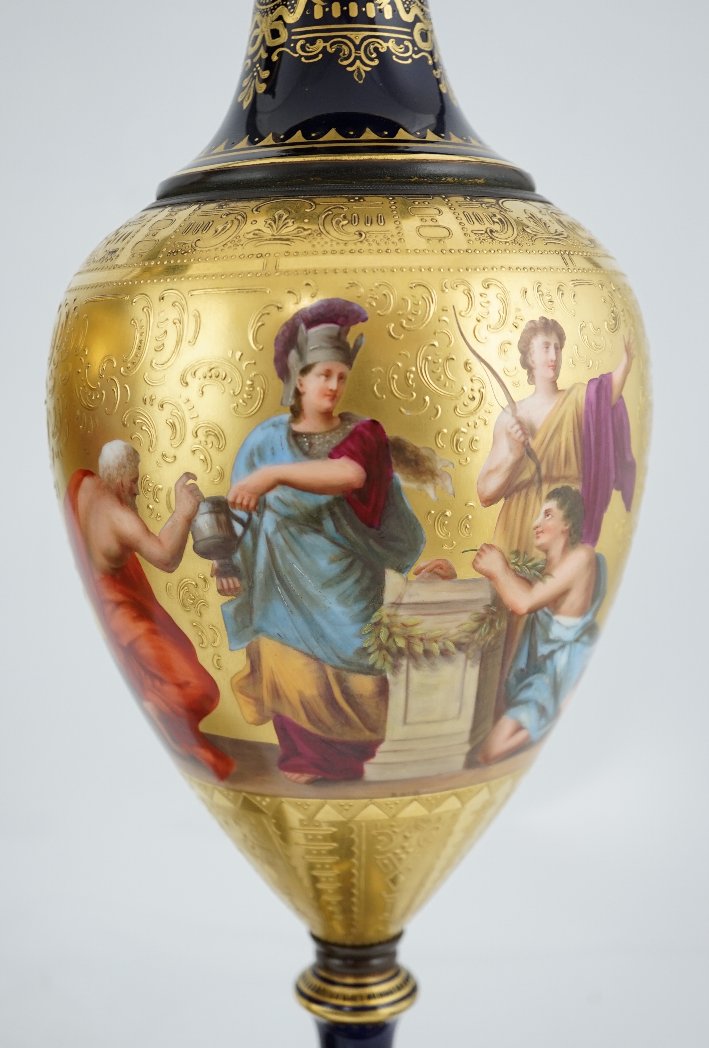 A pair of tall Vienna style porcelain vases and covers, early 20th century